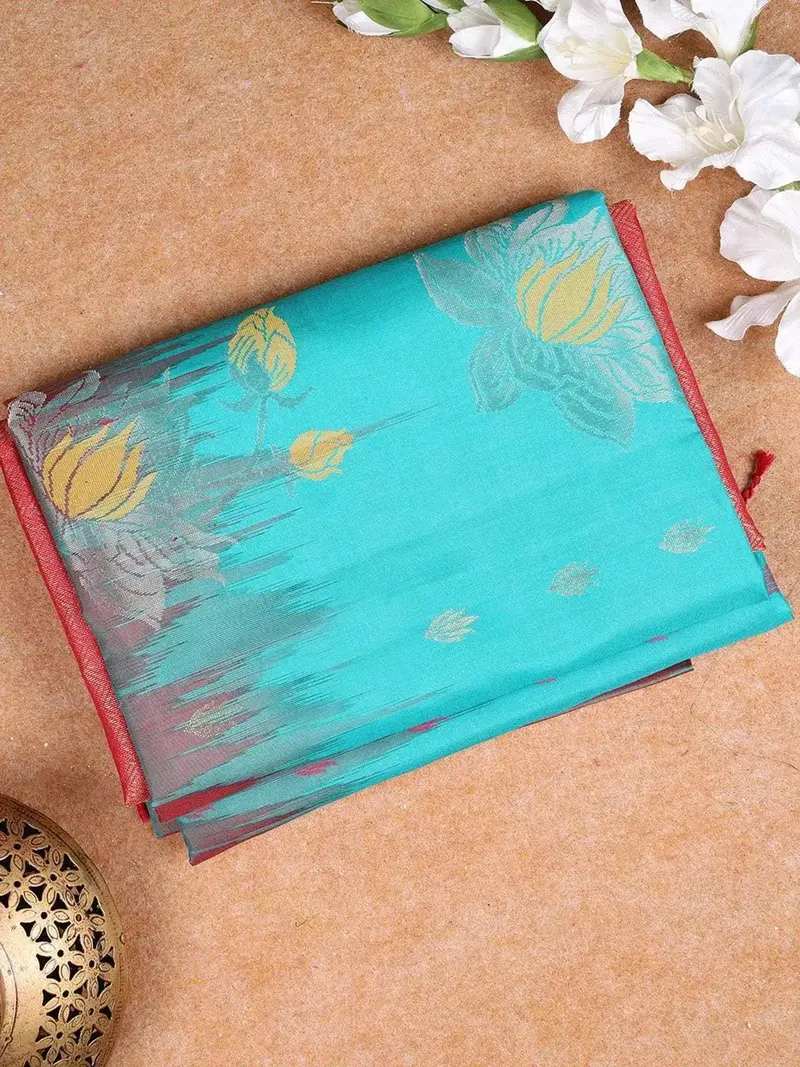 Aqua Blue Soft Silk Saree With Flower And Leaf Design On The Body And Without Border 1