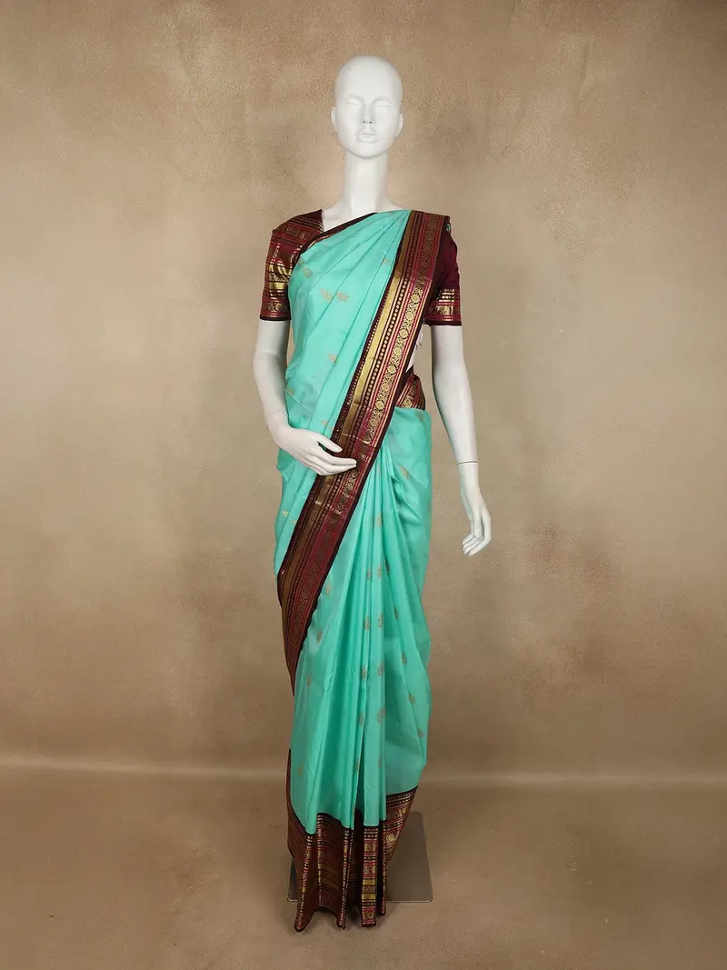 Aqua Green Butta Woven Design Pure Kanchipuram Silk Saree With Contrast  Elephant Motif Zari Border 1