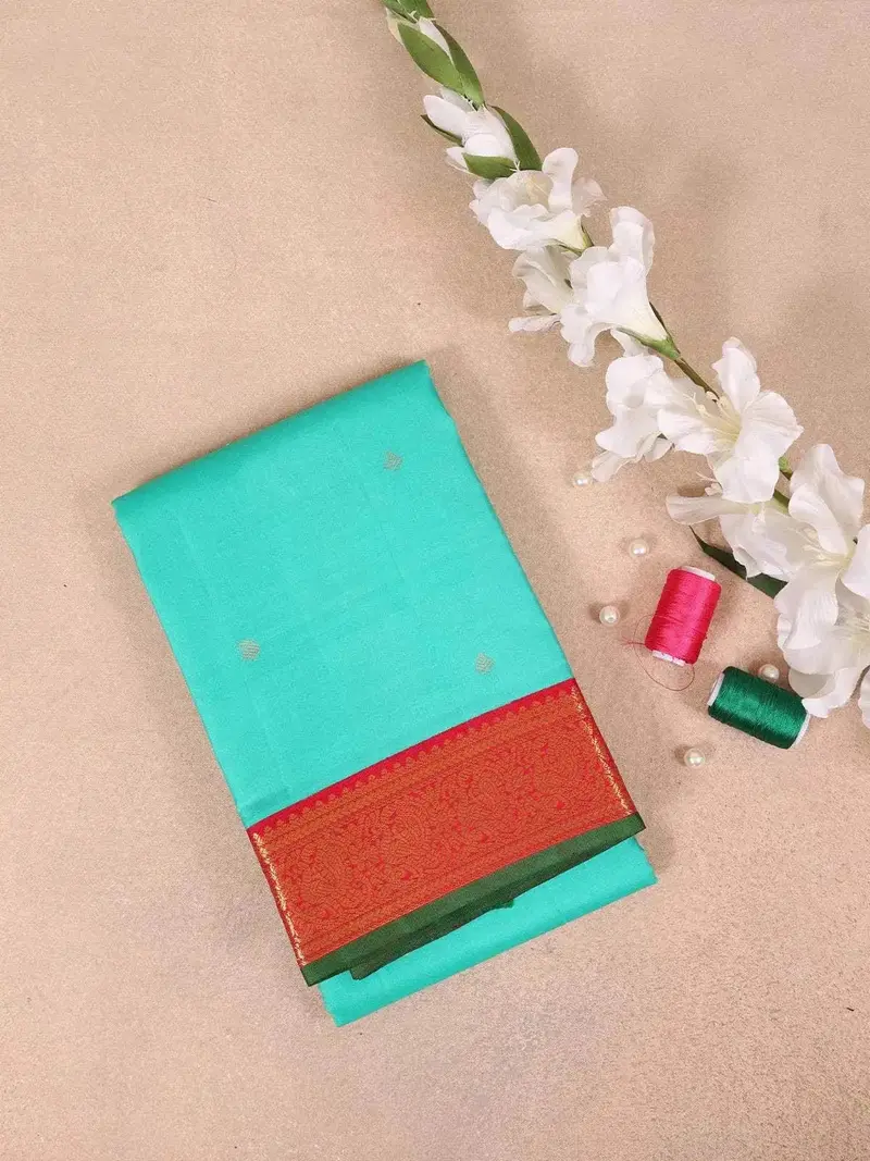 Aqua Green Pure Kanchipuram Bridal Silk Saree With Small Paisley Motif On The Body With Zari Border 1