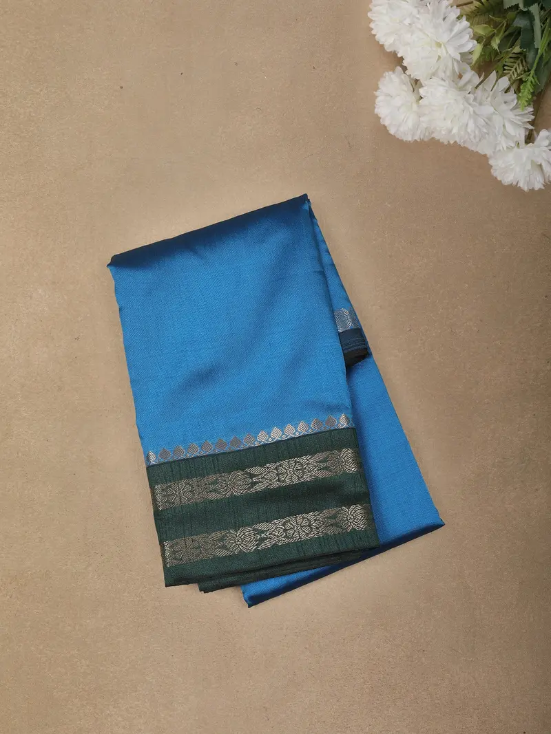 Azure Blue Solid Design Semi Silk Fancy Saree With Contrast Zari Border 1