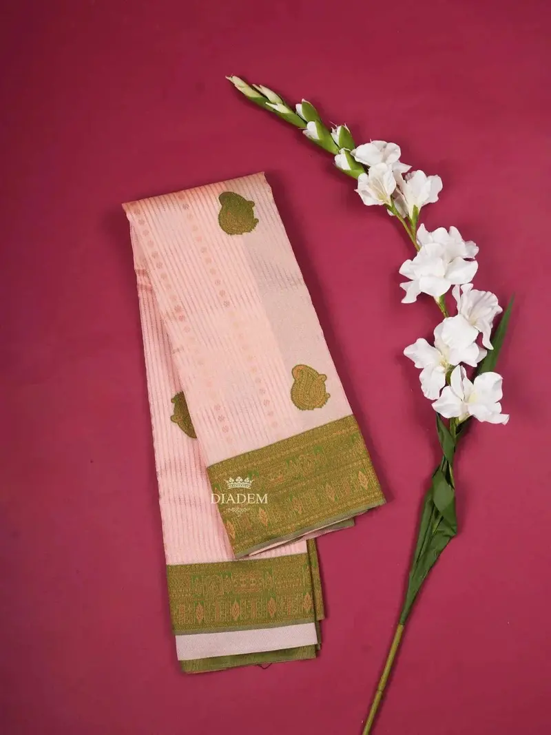 Baby Pink Art Silk Saree With Paisley And Stripes Pattern On The Body With Contrast Zari Border 1