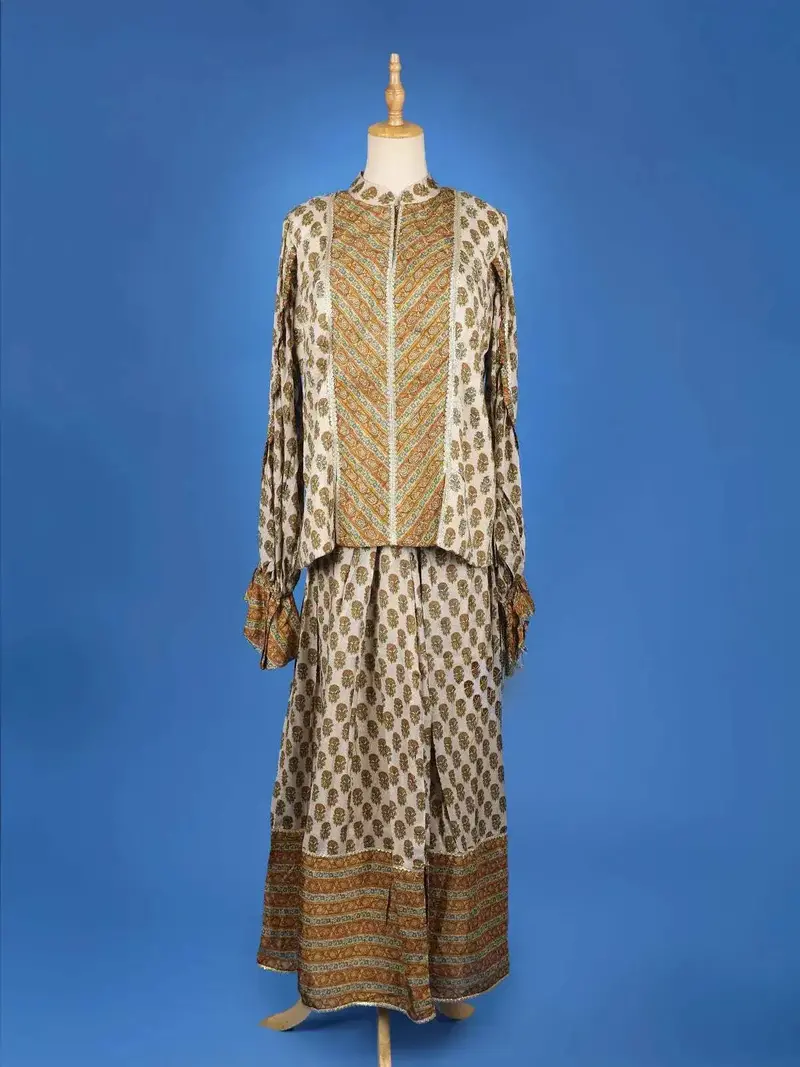 Beige Palazzo Salwar Suit Adorned With Floral Prints With Closed Collar And Full Sleeve 1
