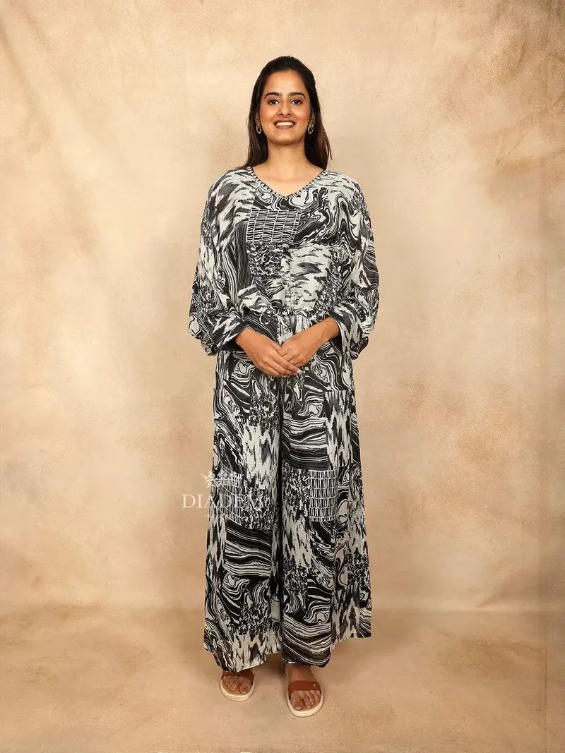 Black Palazzo Salwar Suit Adorned With Sequins And Flower Designs 1