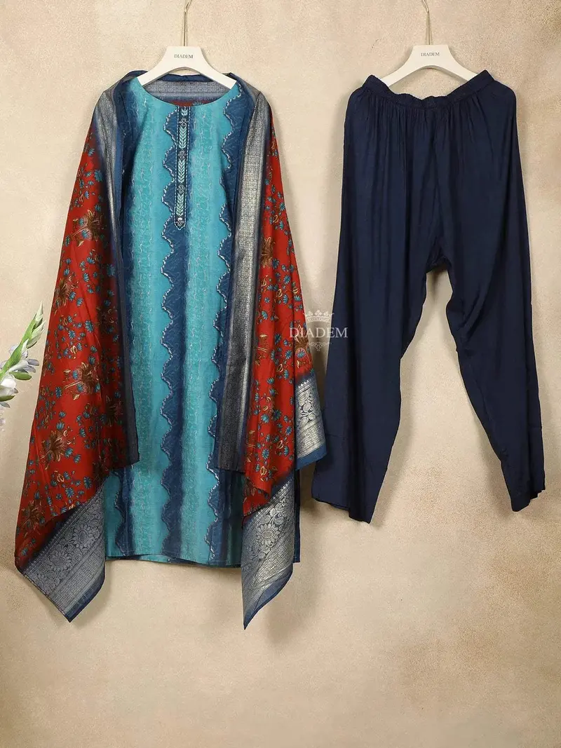 Blue Cotton Straight Cut Salwar Suit For Women Adorned With Sequins And Design Prints Paired With Dupatta 1