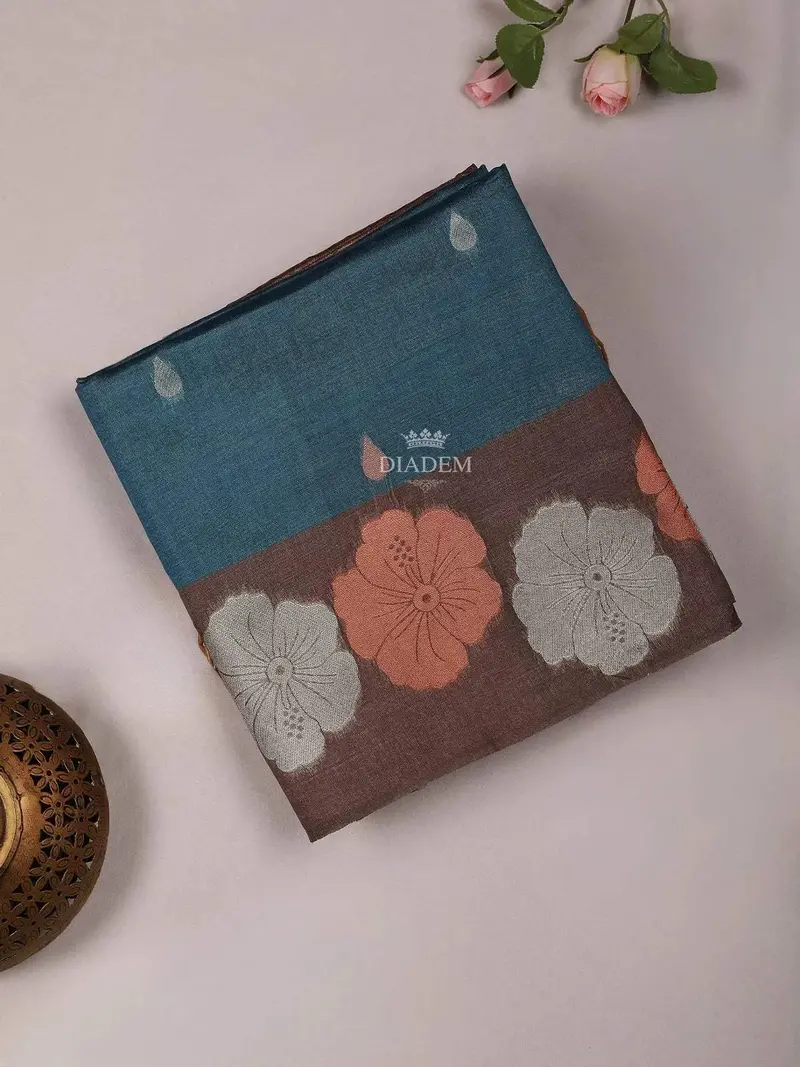 Blue Semi Tussar Silk Saree With Floral Design On The Body With Floral Border 1
