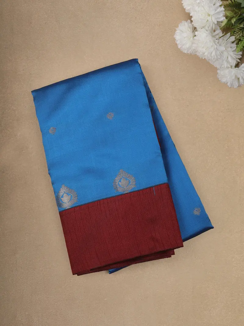 Bright Sky Blue Butta Zari Woven Design Semi Silk Fancy Saree With Contrast Border 1