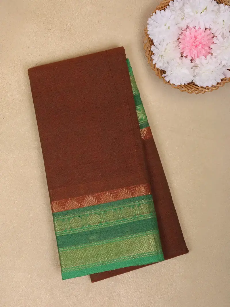 Brown Solid Design Cotton Saree With Contrast Green Zari Border 1