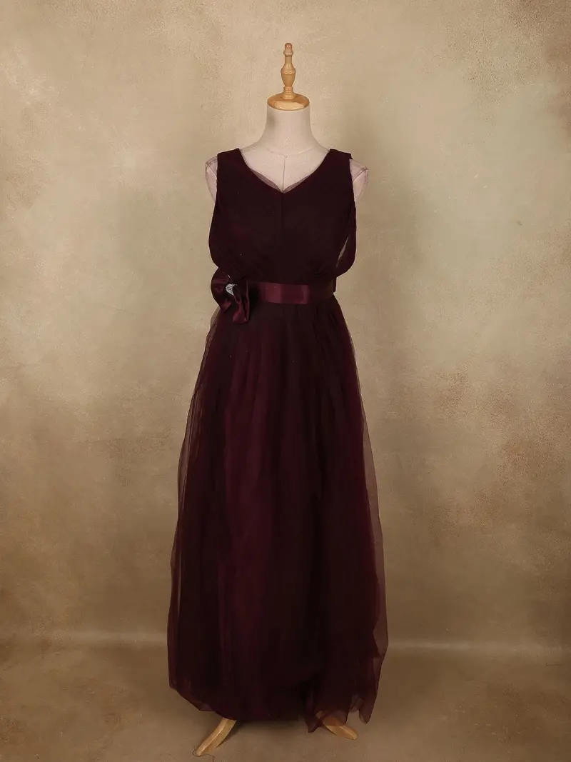Burgundy Pleated Design Net Party Wear Gown With Bow Waist Detail 1