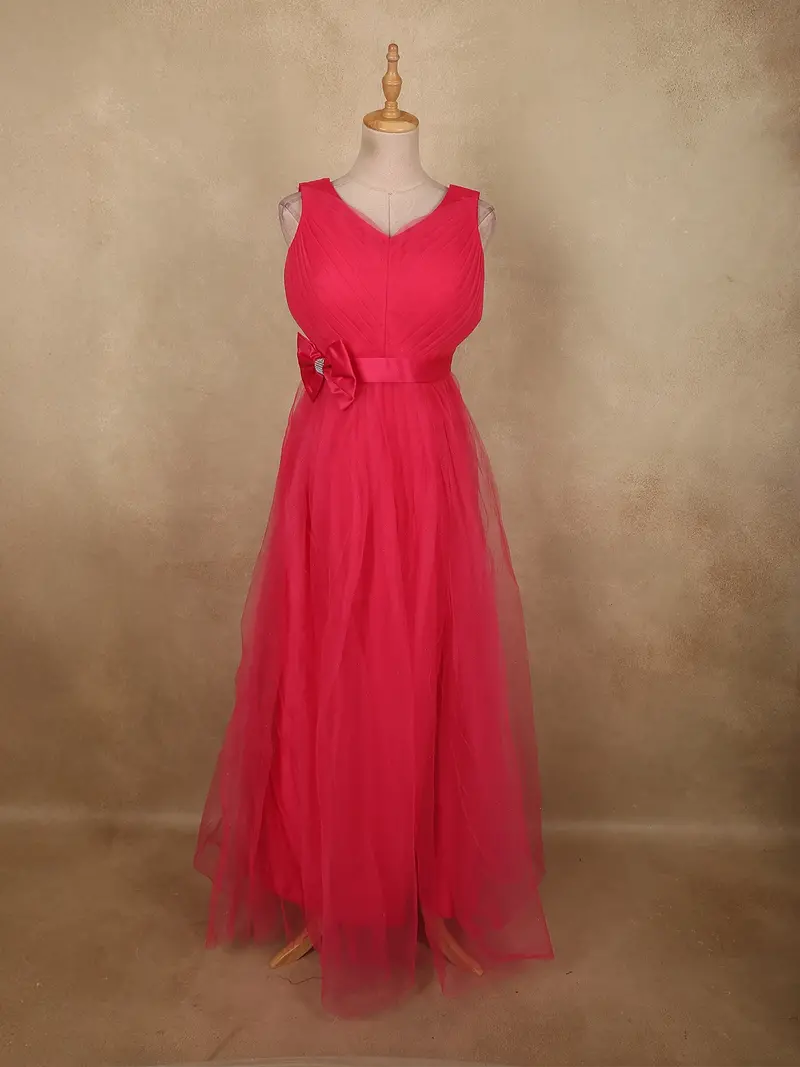 Coral Pink Pleated Design Net Party Wear Gown With Bow Waist Detail 1