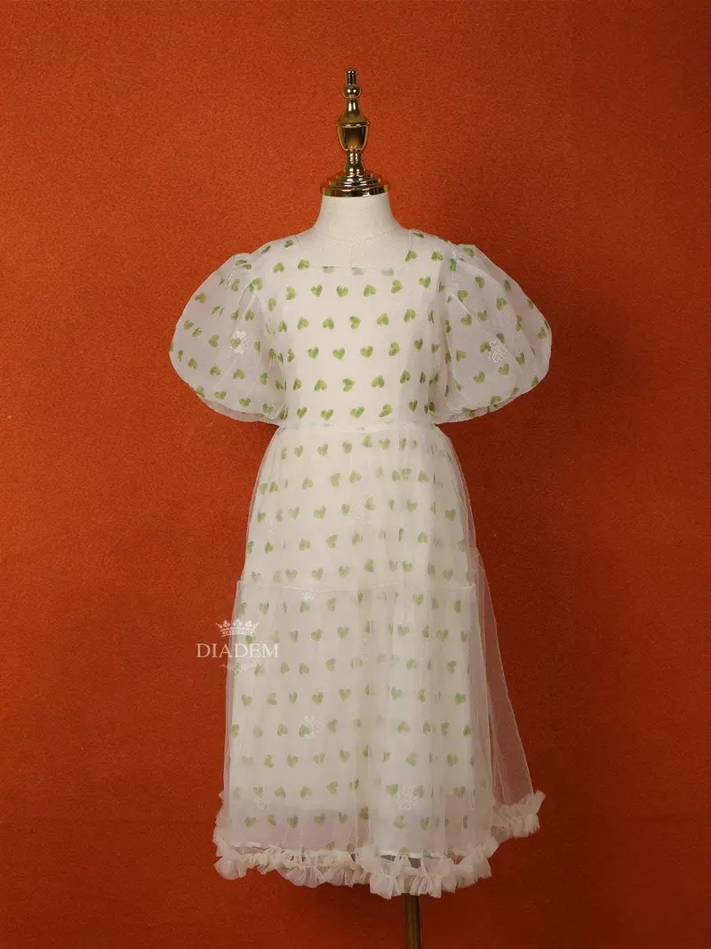 Cream Net Frock Adorned With Heart Prints And Puff Sleeves 1