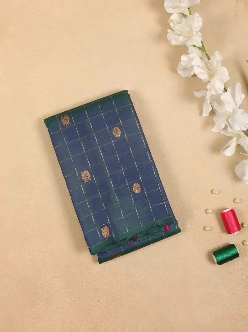 Dark Blue Pure Kanchipuram Silk Saree With Chakra And Peacock Motif On The Body With Zari Border 1