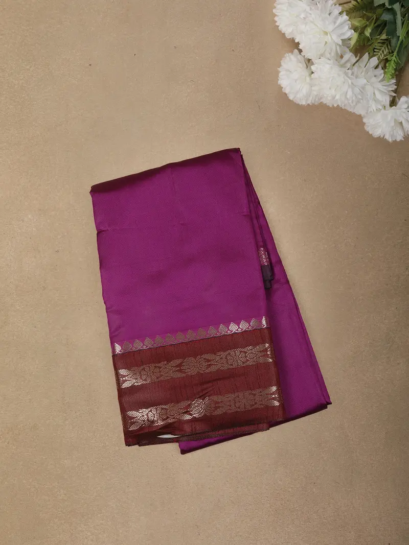 Deep Purple Solid Design Semi Silk Fancy Saree With Contrast Zari Border 1