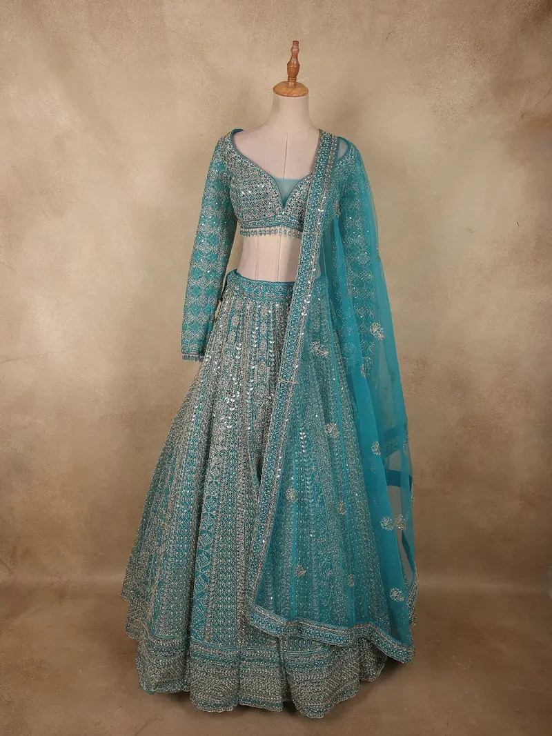Elegant Teal Blue Heavy Beads And Mirror Embroidered Design Net Bridal Lehenga With Dupatta 1