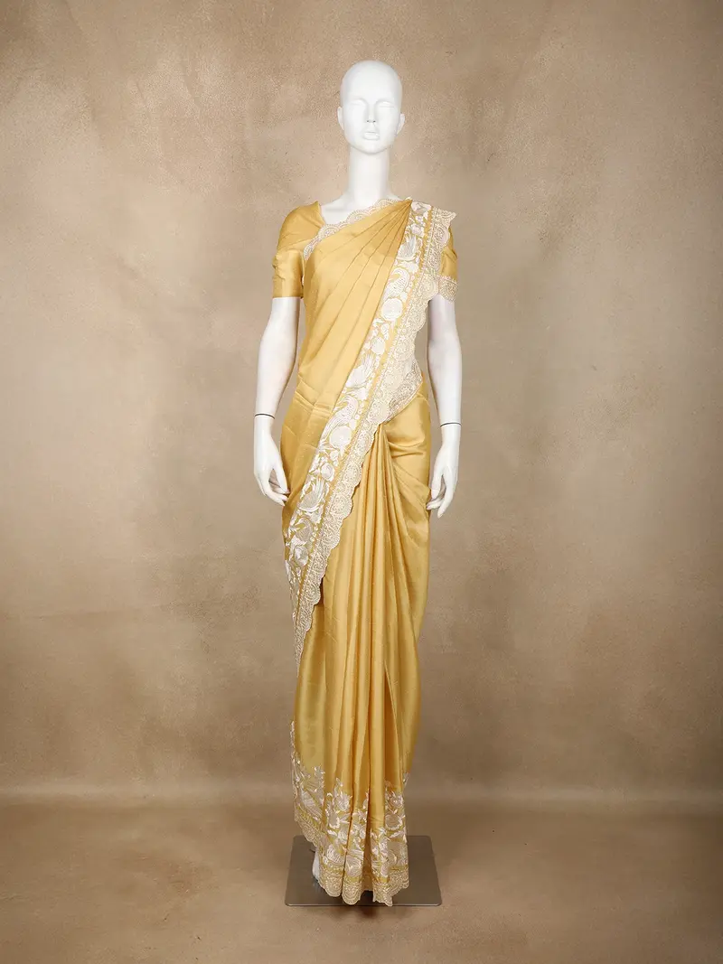 Golden Solid Design Tussar Saree With White Thread Embroidered Lace Border 1