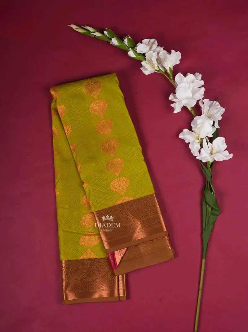 Green Art Silk Saree With Leaf Design On The Body With Contrast Designed Border 1