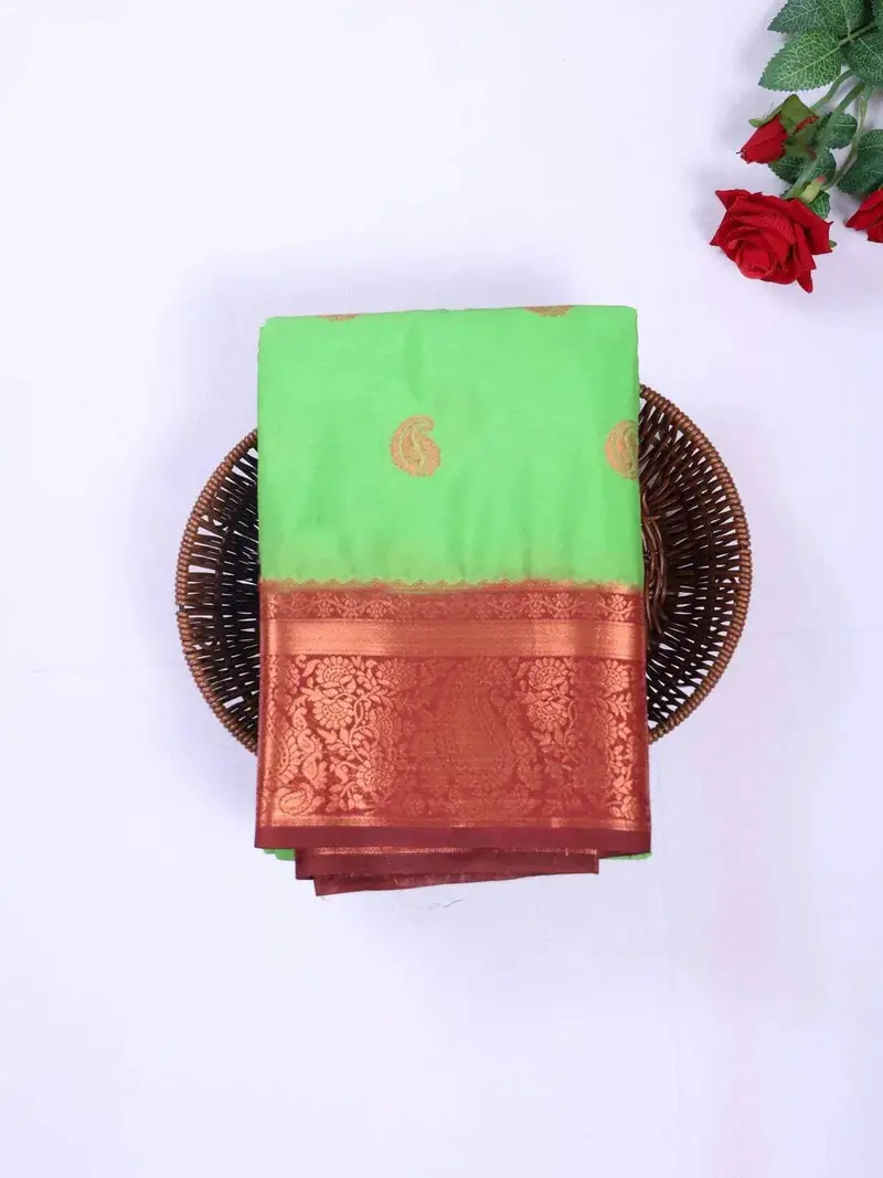 Green Art Silk Saree With Paisley Motif On The Body And Contrast Zari Border 1