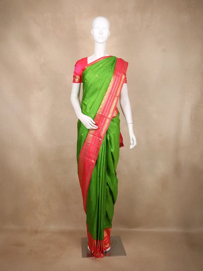 Green Butta Woven Kanchipuram Silk Saree With Contrast Pink Zari Border 1