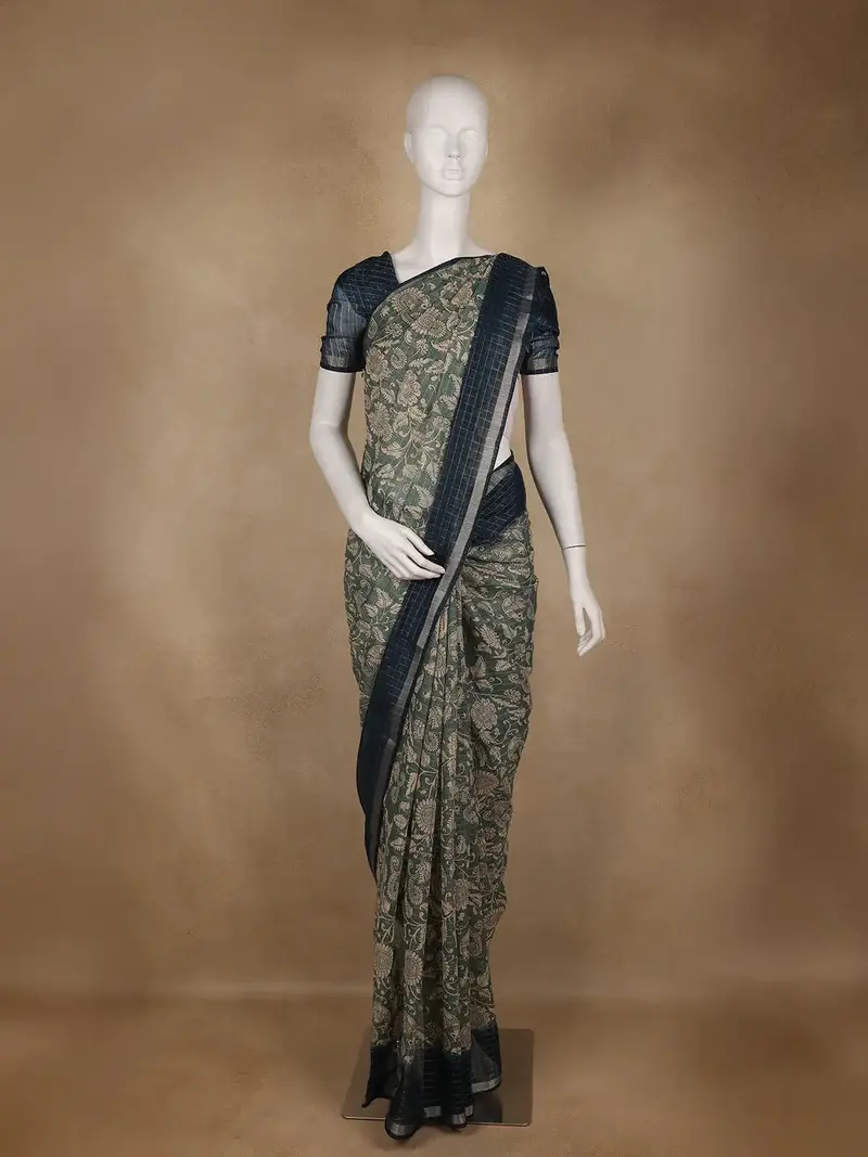 Green Kalamkari Printed Tussar Silk Saree With Contrast Teal Blue Border 1
