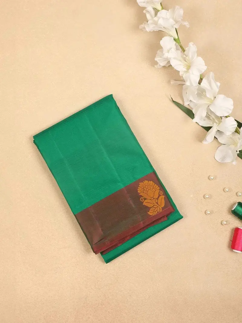 Green Pure Kanchipuram Bridal Silk Saree With Stripes Design On Body With Zari Border 1