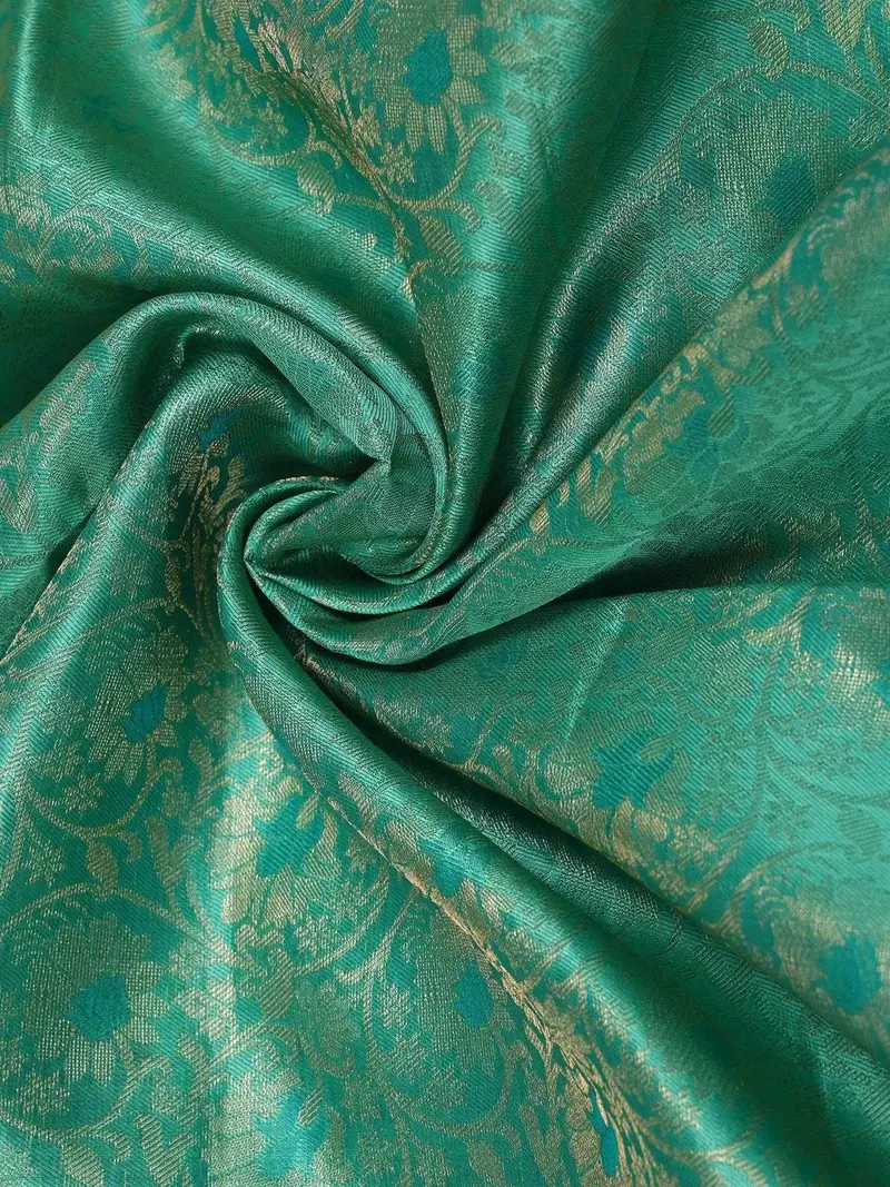 Green Soft Silk Saree With Floral Jacquard Design On The Body With Contrast Border 2