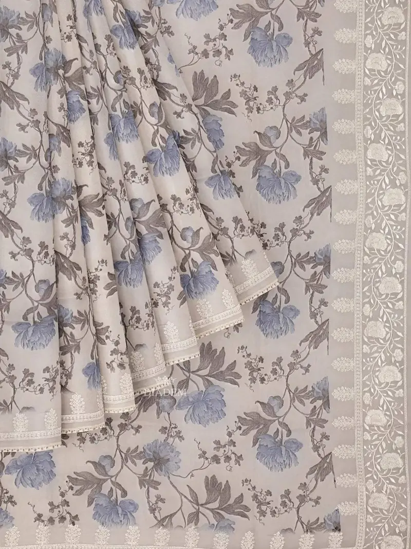 Ivory And Blue Organza Silk Saree With Floral Prints On The Body And Embroidery Border 1