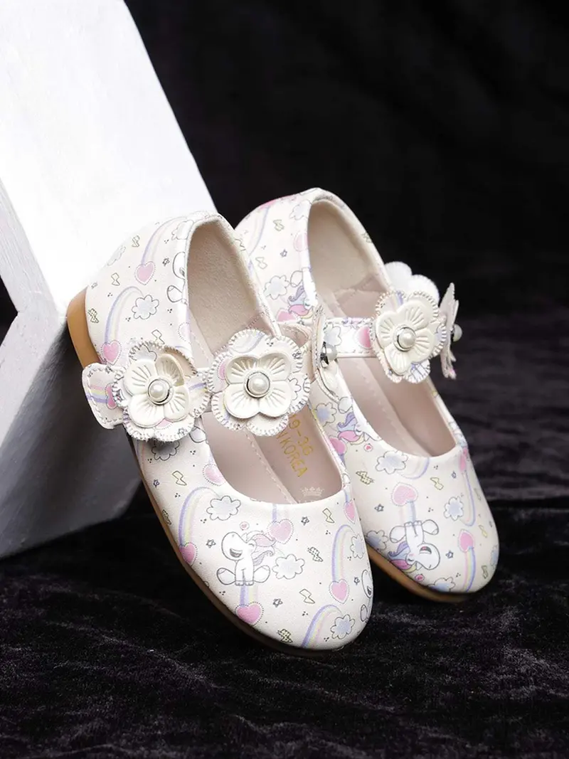 Ivory Ballerinas With Unicorn Print And Attached 3D Flowers For Girls 1