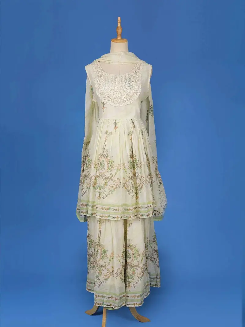 Ivory Cotton Sharara Salwar Suit Adorned With Printed Floral Design And Lace Work, Paired With Dupatta 1