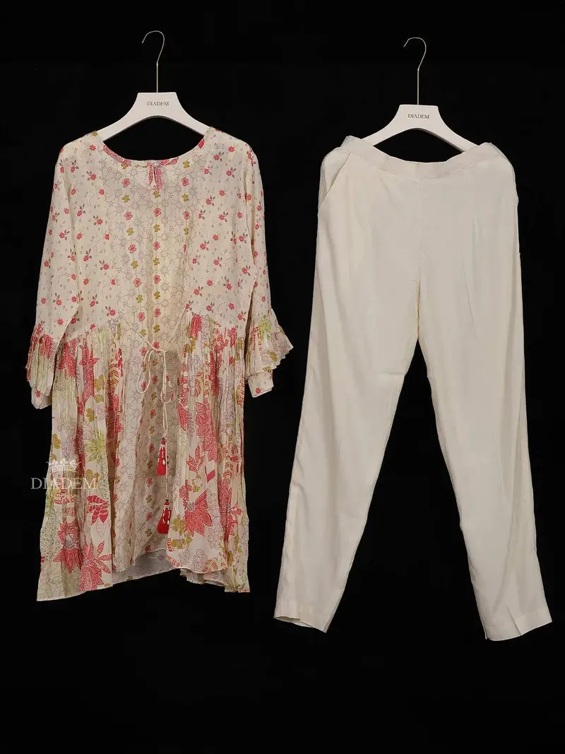 Ivory Crepe Straight Cut Salwar Suit For Girls Adorned With Floral Prints 1