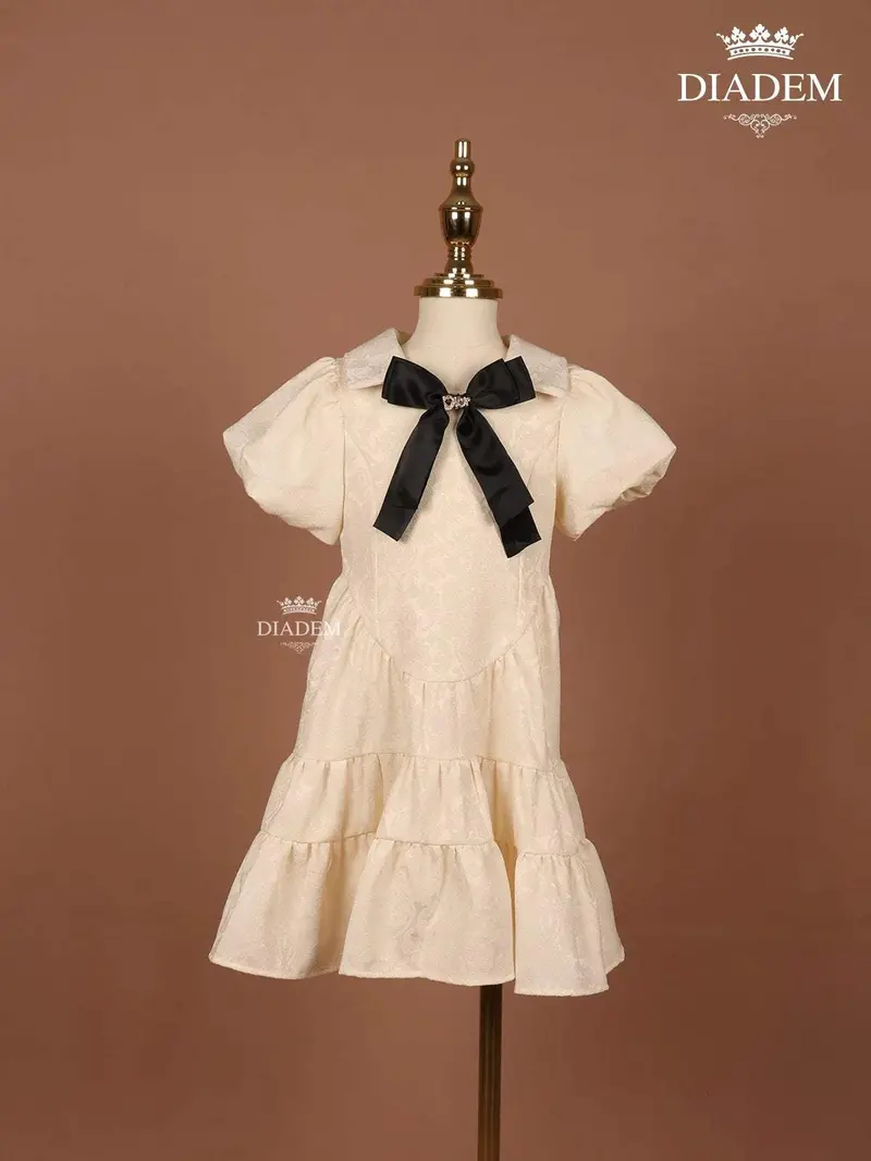 Ivory Embossed Cotton Frock With Attached Bow 1