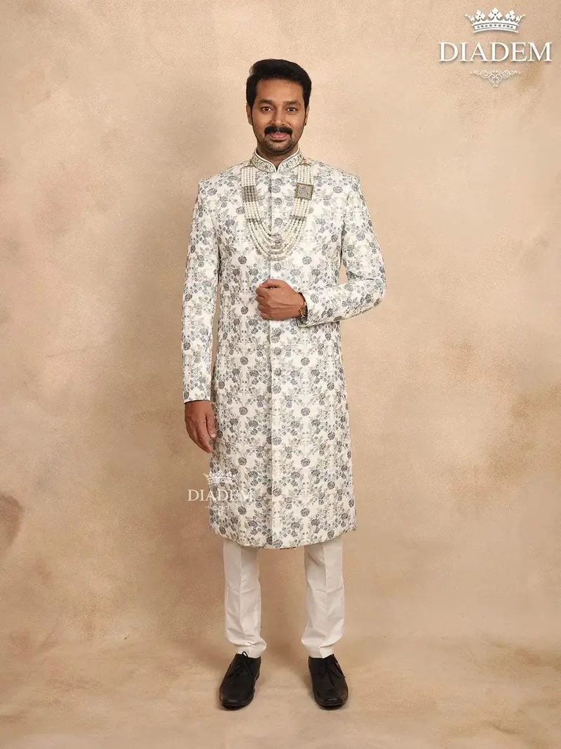Ivory Silk Sherwani Suit With Floral Embroidery, Paired With Bead Mala 1