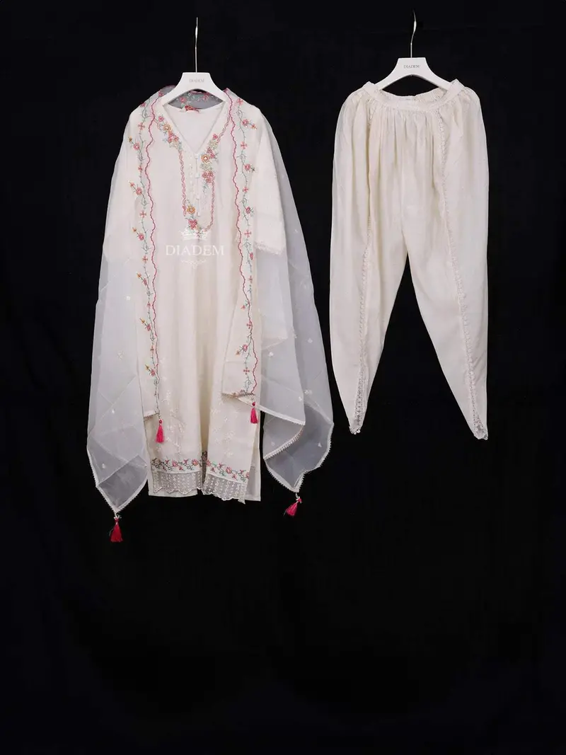 Ivory Straight Cut Salwar Suit Adorned With Sequins And Floral Design With Dupatta 1
