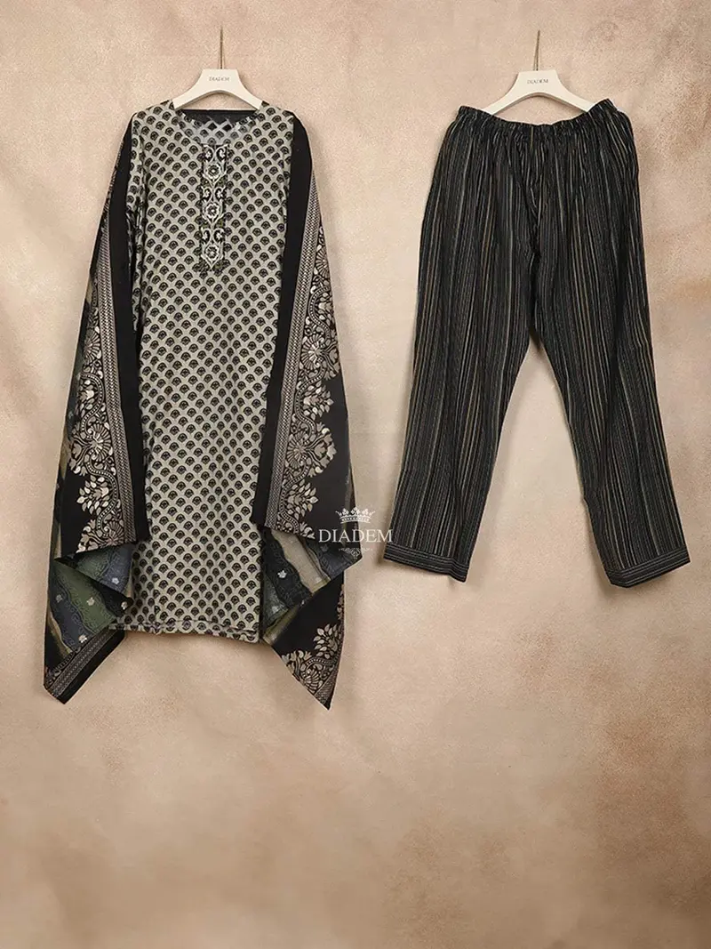 Ivory Straight Cut Salwar Suit For Girls Adorned With Scallop Shells Design And Paired With Dupatta 1