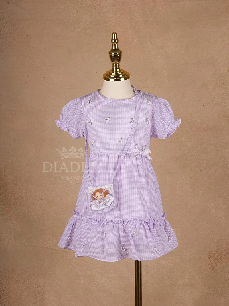 Lavender Cotton Frock Adorned With Floral And Small Checks Designs And Sling Bag For Girls 1