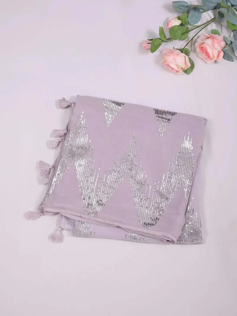 Lavender Georgette Saree With Sequins Designs On The Body And Embroidery Border 2