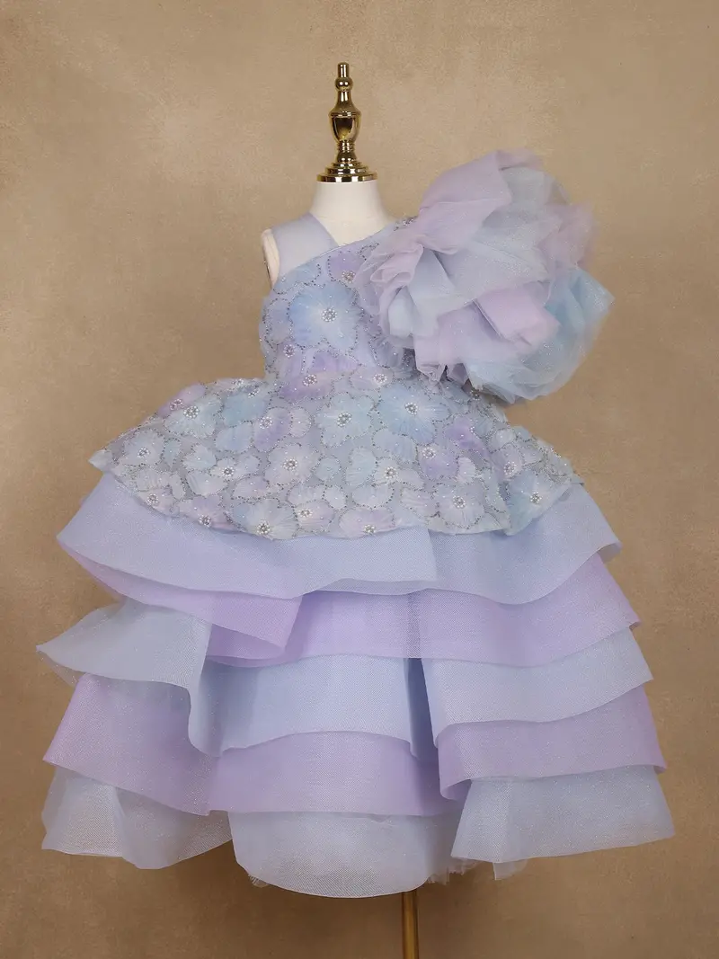 Lavender Layered Ruffle Design Net  Kids Gown With 3D Floral Work 1