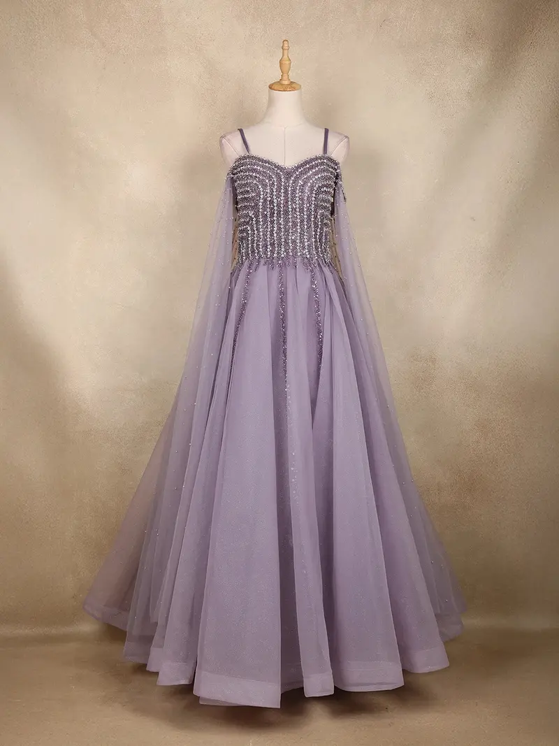 Lavender Sequins Embellished Net Partywear Gown With Cape Sleeves 1
