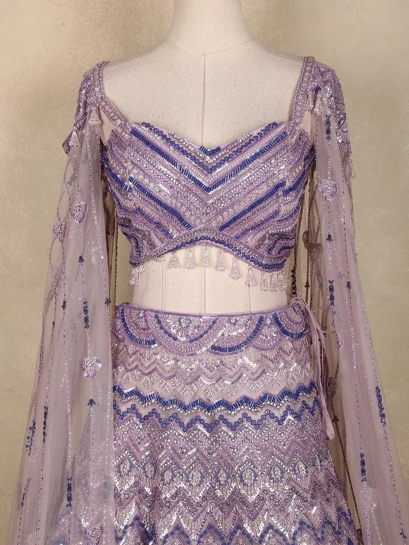 Lavender Sequins Embroidered Net Lehenga Set With Cape Sleeves 2