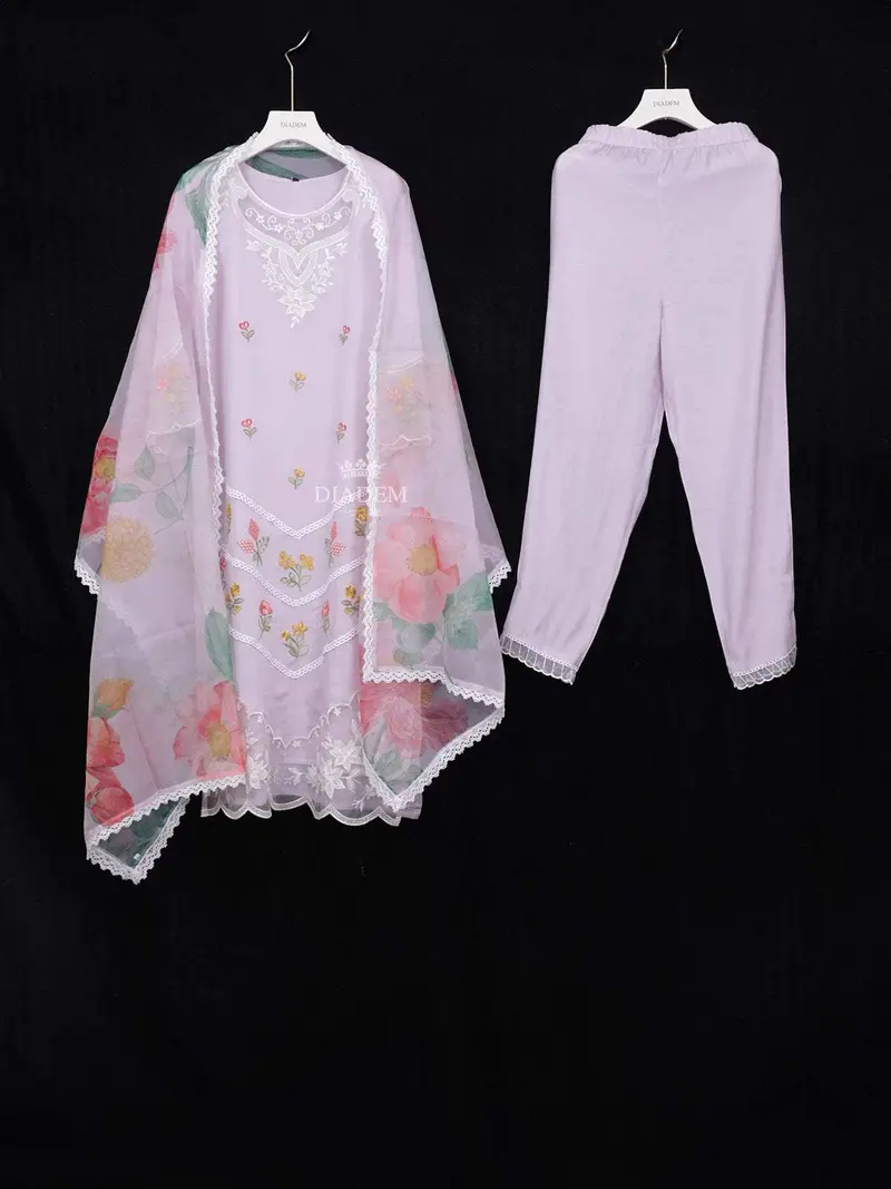 Lavender Straight Cut Salwar Suit Adorned With Flower Design Paired With Dupatta 1