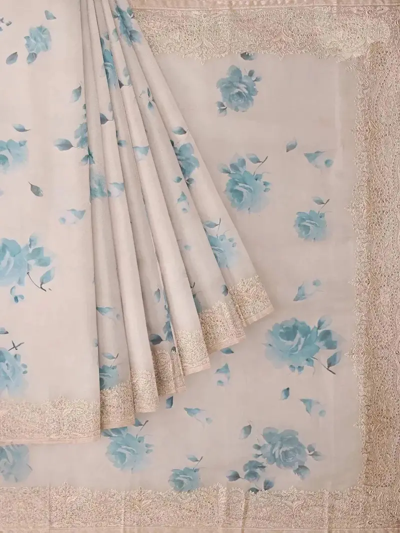 Light Beige Semi Organza Saree With Floral Prints On The Body With Embroidery Border 1