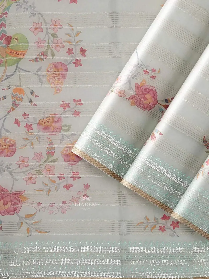 Light Blue Organza Silk Saree With Floral Prints On The Body And Embroidery Border 2