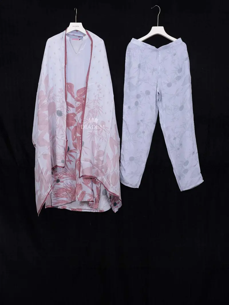 Light Blue Straight Cut Salwar Suit Adorned With Flower Design Paired With Dupatta 1