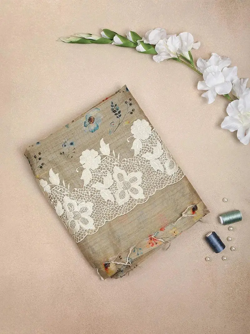 Light Brown Semi Tussar Silk Saree With Flower Design On The Body With Designed Lace Border 1
