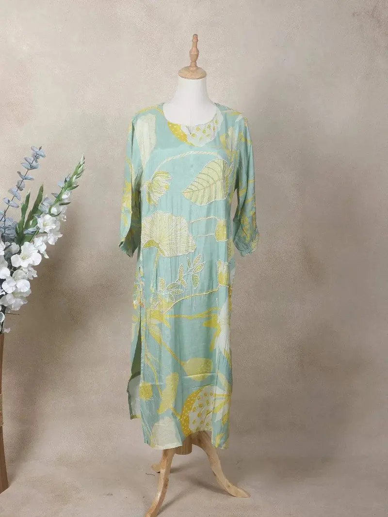 Light Green Crepe Kurti Top Adorned With Sequins And Floral Prints 1