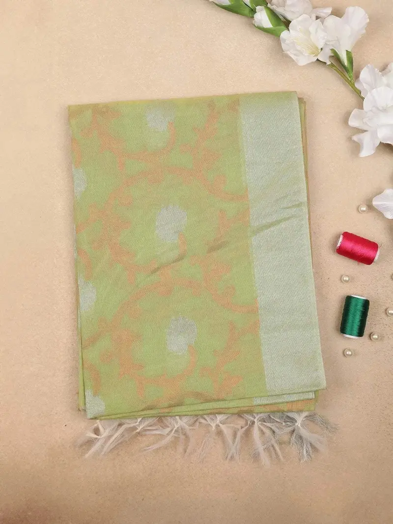Light Green Silk Cotton Saree With Flower And Leaf Design On The Body With Matching Border 1