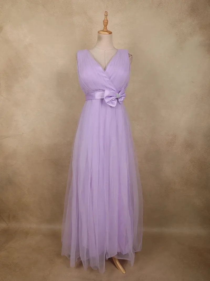 Light Lavender Pleated Design With Bow Embellishment Net Party Wear Gown 1