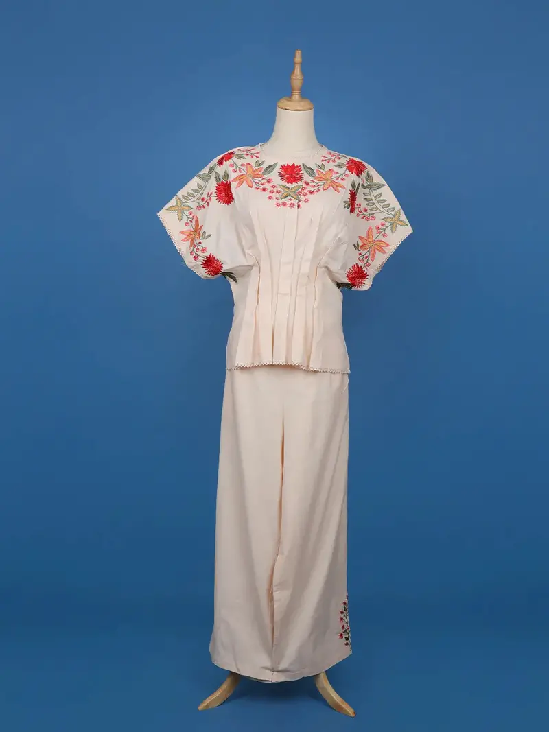 Light Peach Floral Designed Net Salwar Suit 2