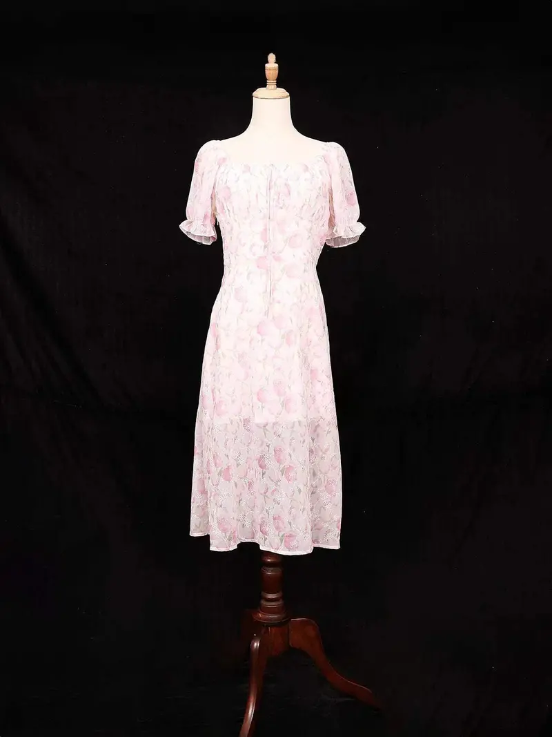 Light Pink Frock Adorned With Flower Designs 1
