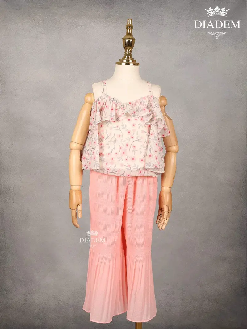 Light Pink Sharara Pant And Peplum Top Adorned With Floral Prints 1
