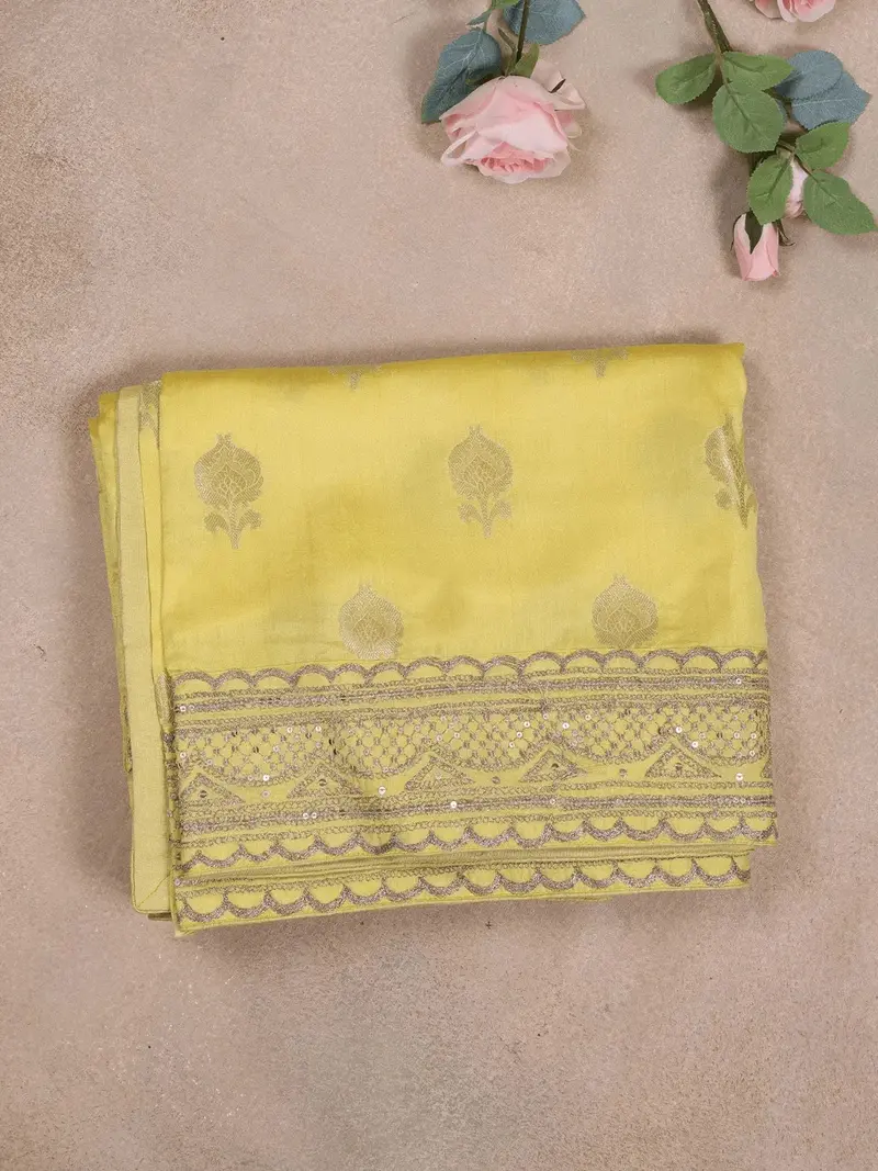 Light Yellow Organza Saree With Floral Designs On The Body And Paired With Designer Blouse 1