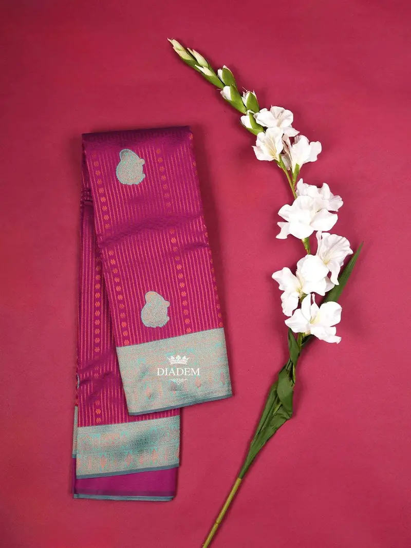 Magenta Art Silk Saree With Paisley Stripes Pattern On The Body With Contrast Border 1